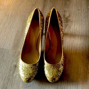 8.5 size Nine West gold high heels